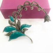 GÜMÜŞ MARKAZİT VE TURKUAZ MİNE İŞLEMELİ SARMAŞIK BROŞ