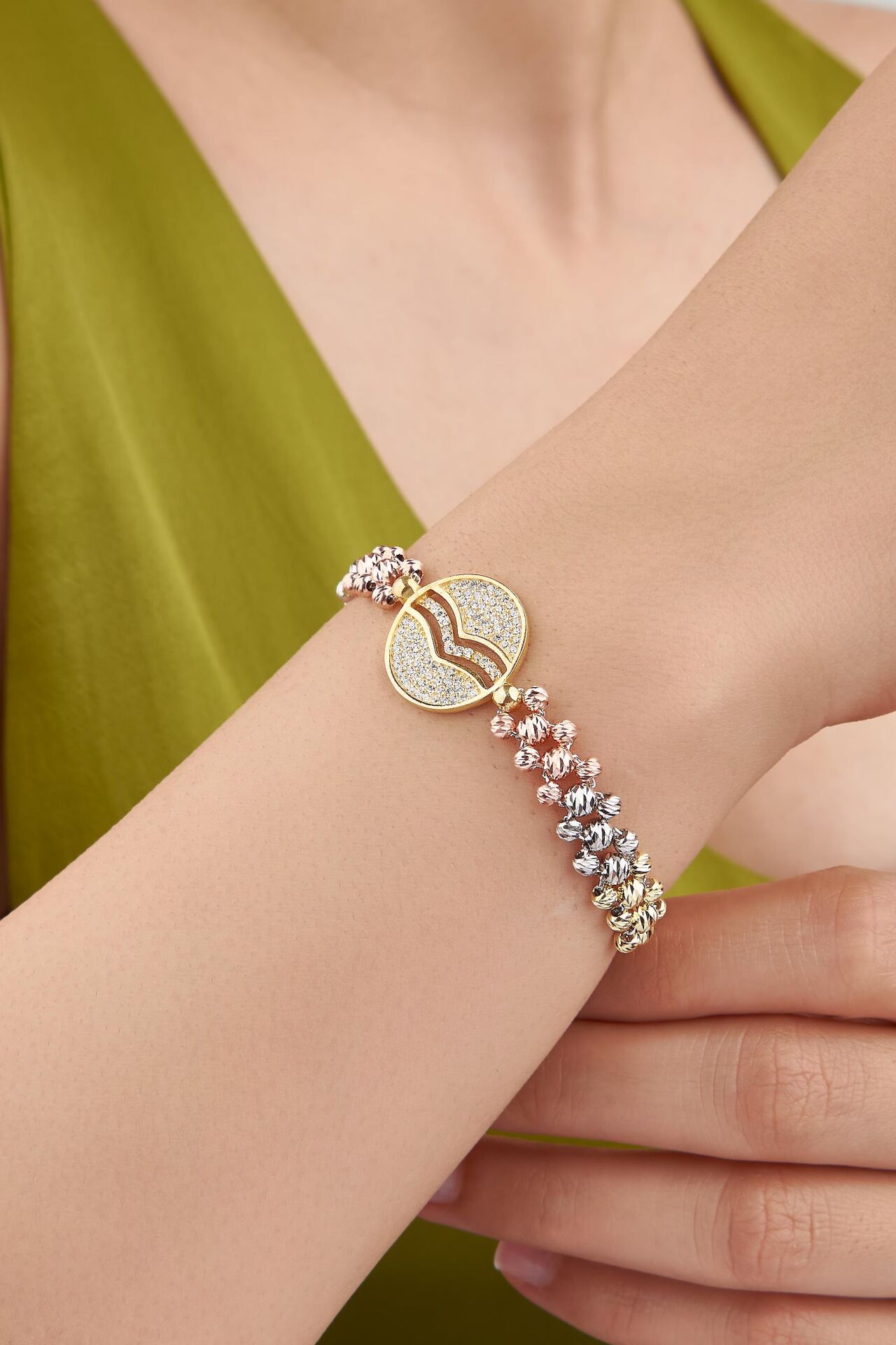 GÜMÜŞ DORİKA Dorica TOPLU YUVARLAK ZİRKON TAŞLI ÖRGÜ ROSE ALTIN VE GÜMÜŞ RENKLİ KANAT BİLEKLİK