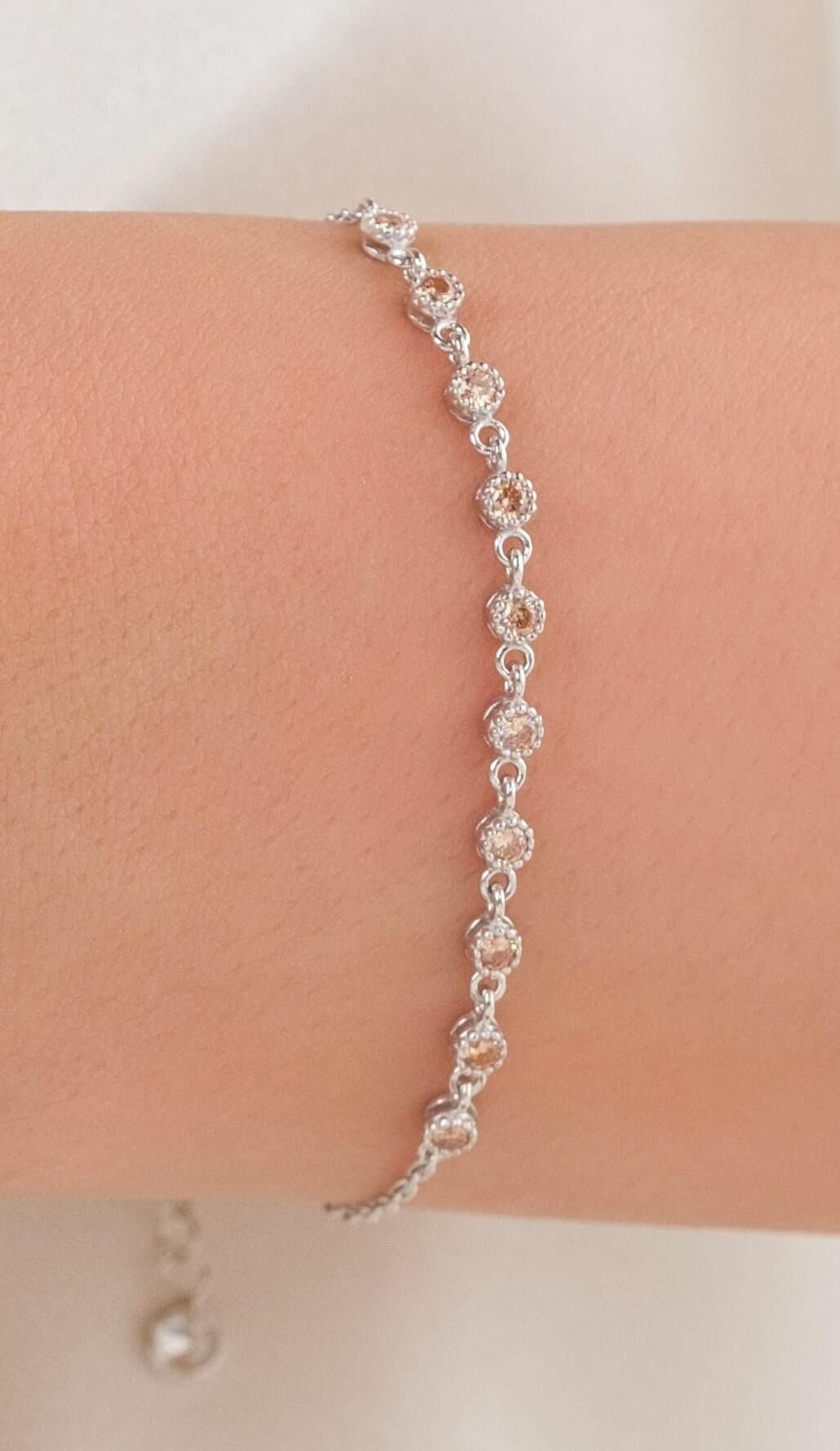 Gümüş Açık Sarı Zirkon Yuvarlak Taşlı Pırlanta Modeli Su Yolu Bileklik