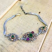 GÜMÜŞ TELKARİ KÖK ZÜMRÜT VE YAKUT TAŞLI BİLEKLİK
