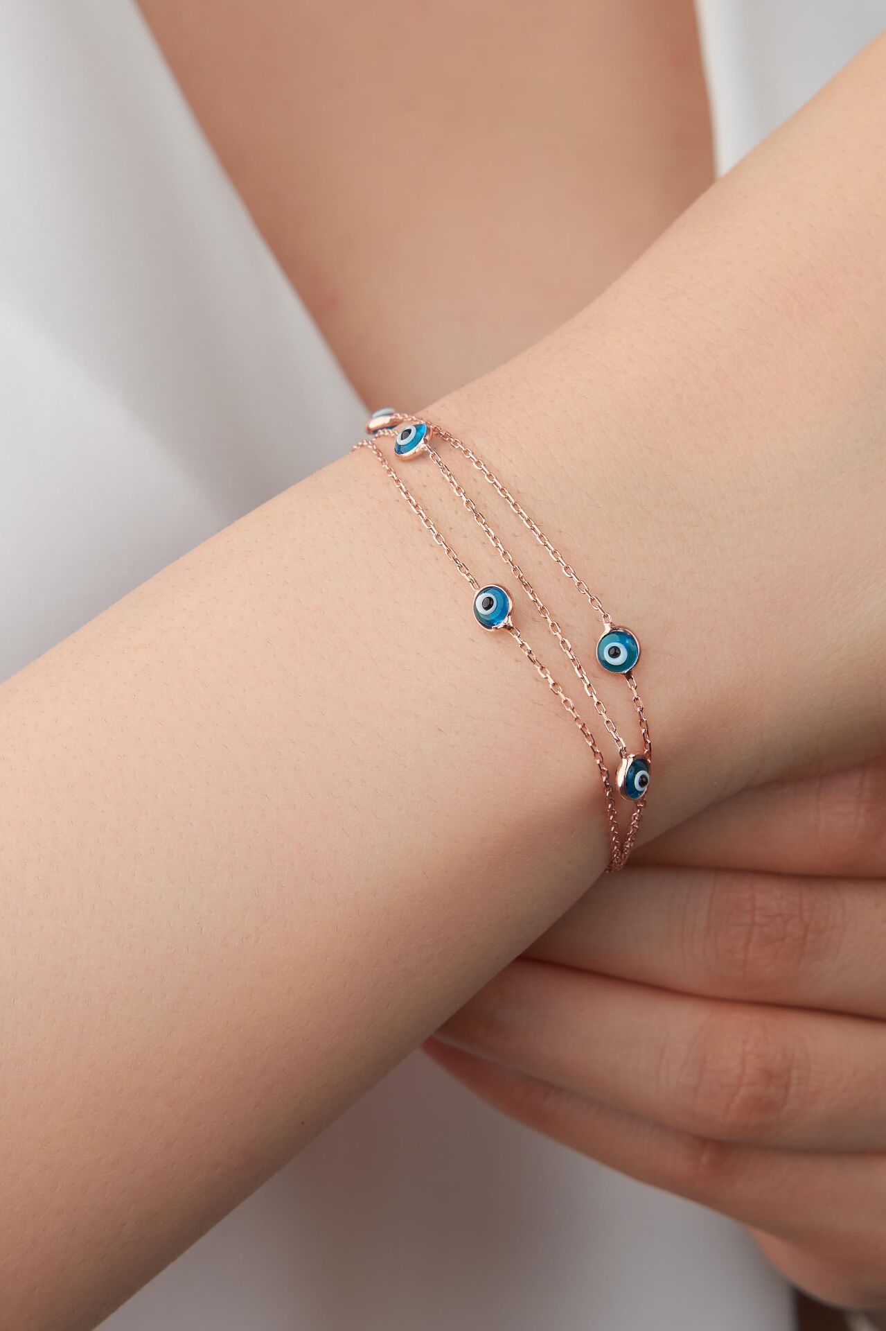 GÜMÜŞ ROSE GÖZ AÇIK MAVİ NAZAR BONCUKLU ÜÇ ZİNCİRLİ BİLEKLİK