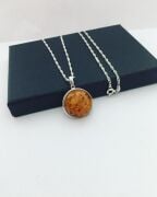 GÜMÜŞ ATEŞ KEHRİBAR YUVARLAK KOLYE