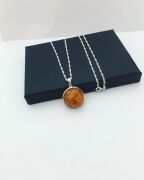 GÜMÜŞ ATEŞ KEHRİBAR YUVARLAK KOLYE