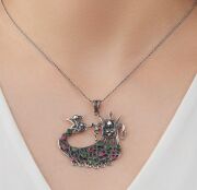 GÜMÜŞ KÖK ZÜMRÜT VE YAKUT TAŞLI TELKARİ ŞAHMERAN KOLYE